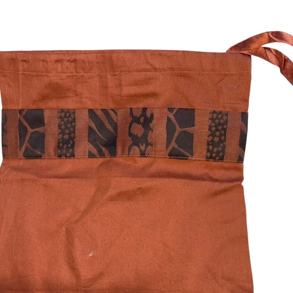Gracious Home New York rust brown black African Animal print trim roll pillow